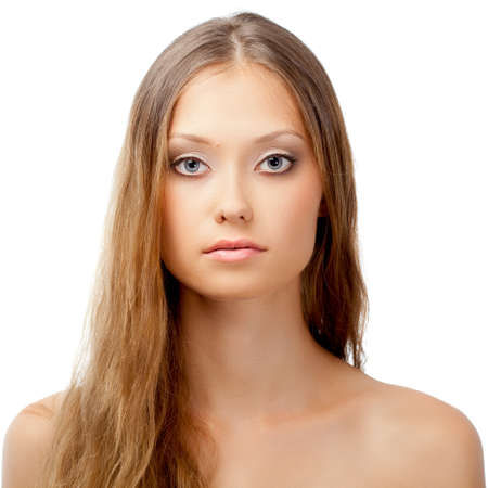 woman face portrait over white background looking at cameraの写真素材
