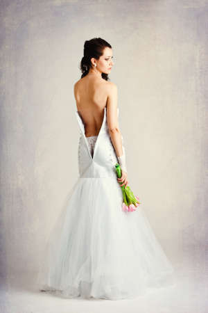 vintage style photo of bareback brideの写真素材