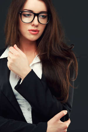 close-up portraits of a business woman on a dark backgroundの写真素材
