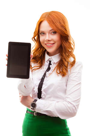 red businesswoman holding tablet isolated over whiteの写真素材