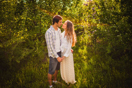 lovely couple walking at summer parkの写真素材