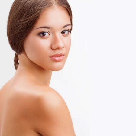 beautiful woman head portrait with naked shoulderの写真素材