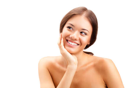 beautiful brunette woman looking  up and smilingの写真素材