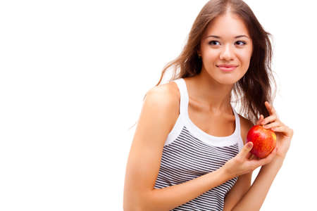 closeup woman portrait with red apple in handの写真素材