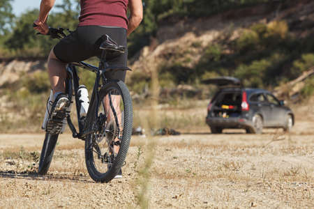 athlete man cycling on a bicycle ounddors in stone pitの写真素材