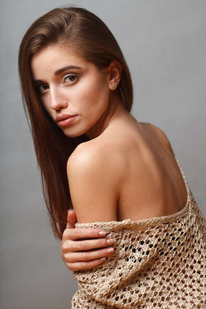 beautiful fashion model closeup portrait over gray backgroundの写真素材