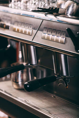 Professional coffee machine closeup view, vertical frameの写真素材