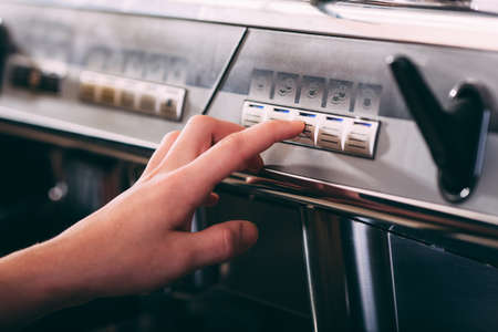 Professional coffee machine closeup view, barista and on button