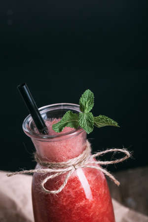 watermelon smoothie in the bottle rusitc styleの写真素材