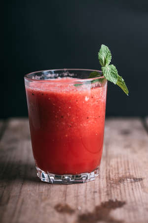 watermelon smoothie in the glass rusitc style verticalの写真素材