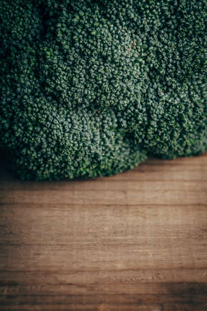 Fresh green broccoli on wood table, closeup, copy space for textの写真素材