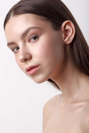 beauty woman head and shoulders portrait, clear shiny skinの写真素材