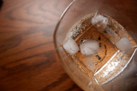 Home-made Cocktail: Close-up of ice in a glass of gin and tonic