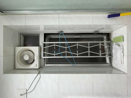 Big window in bathroom in Hong Kong, realistic and undecorated photographyの写真素材