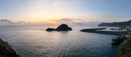 Lanyu, Taiwan - 1 Jun 2023 - Panoramic landscape: Sunset view from Qing Qing Grassland in Lanyuのeditorial素材
