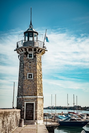 lighthouse , Garda lake, Italyのeditorial素材