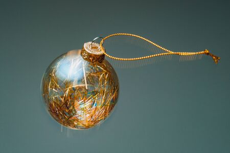 christmas tree decoration made of glass, colorful composition, light reflection, spherical shape