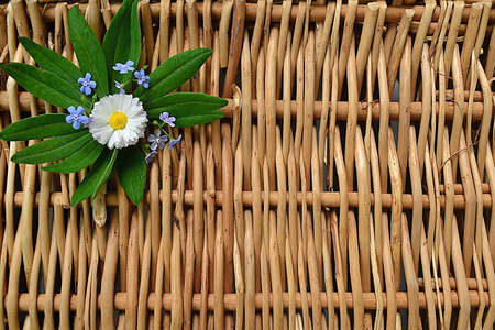 Arrangement of fresh flowers on a basketの写真素材