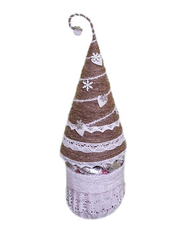 Christmas gift wrapping in the form of a fir-tree, made of paper, lace, cord and braid.の写真素材