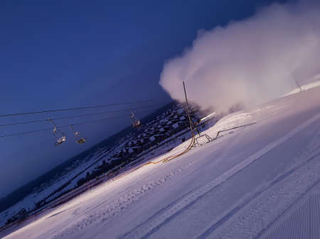 Work snow cannon on the mountainside.の写真素材