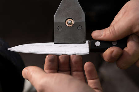 Check the sharpened knife for burrsの写真素材