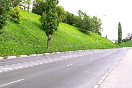 Empty road in the early morning in the city.の写真素材