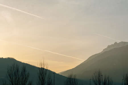 View of the sky and mountains in the morning at dawn which are shrouded in fog. The concept of landscape, vacation, campingの写真素材