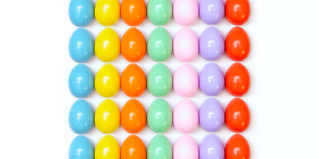 Top view of an Easter composition of painted eggs in bright juicy colors on a white background with a glossy texture that lie in even rows. Holiday concept, flat layout, background, advertisementの写真素材