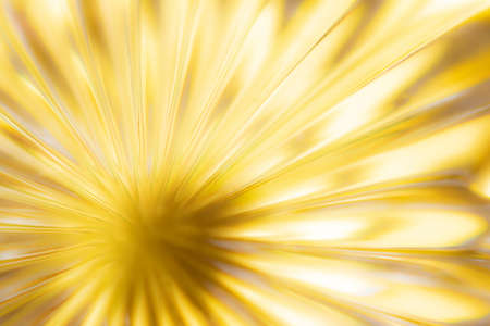 Abstract blurred background in the form of a flower and sun rays of gold color. Concept background, textureの写真素材