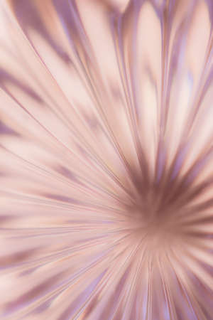 Abstract blurred background in the form of a flower and sun rays of pink color. Concept background, textureの写真素材