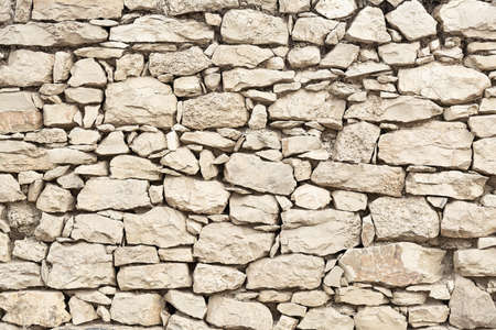 Wall texture with masonry of beige color. Concept background, texture, architectureの写真素材