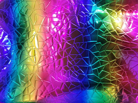 A shiny neon colored surface with many small triangular shaped cells. Concept texture, background.の写真素材