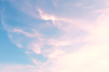 Blue sky with clouds in the form of pink streaks. Concept landscape, abstractionの写真素材