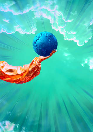 Contemporary collage. An orange hand on a background of a dark blue sky with clouds in which lies a ball in the form of a planet.の写真素材