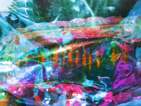 Abstract background with glossy glowing texture in turquoise pink and orange tones. Concept background, textureの写真素材