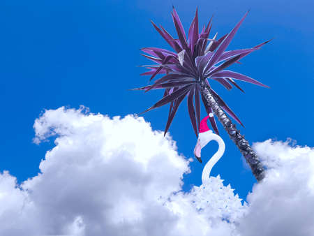 Contemporary collage. 3D illustration. White flamingo in a Christmas cap in the clouds under a palm tree.の写真素材