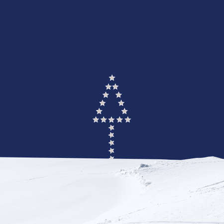 Contemporary collage. 3D illustration. Christmas background with an abstract fir tree made of stars on the snow on a blue backgroundの写真素材