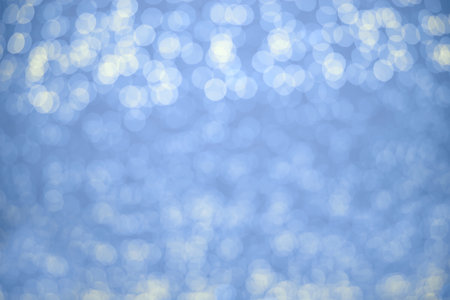 Abstract blue background with beautiful bokeh white colors. Concept background, christmas.の写真素材