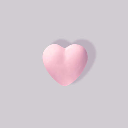3d illustration. Porcelain pink heart on a gray background with shadow.の写真素材