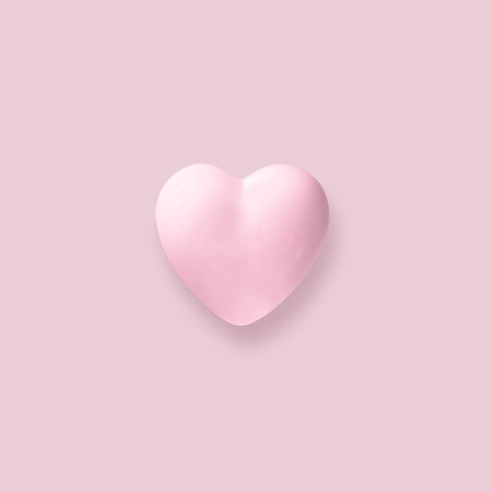 3d illustration. Porcelain pink heart on a pink background with shadowの写真素材