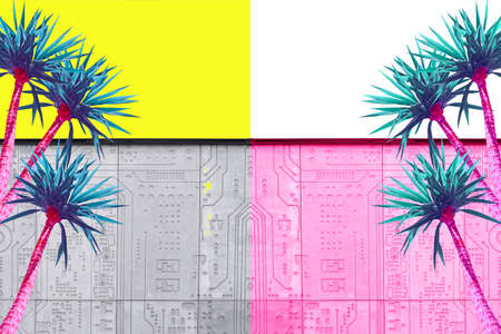 Abstract pink and turquoise palms on a yellow background and a gray buildingの写真素材
