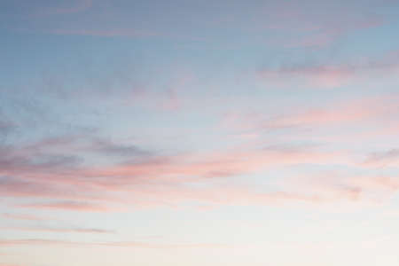 Bright colorful sky at sunset in pink purple and blue colors.の写真素材