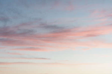 Bright colorful sky at sunset in pink purple and blue colors.の写真素材