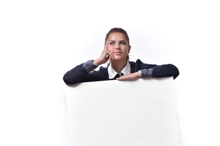 Woman thinking with blank empty paper billboard with copy space for text isolated on whiteの写真素材