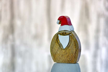 Lovely Merry Christmas and Happy new Year 2019, with Santa Claus wood figurine on isolated background with copy spaceの写真素材