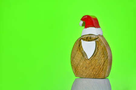 Lovely Merry Christmas and Happy new Year 2019, with Santa Claus wood figurine isolated on white...