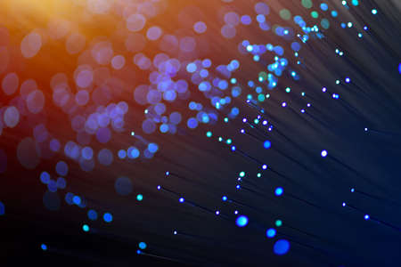Fiber optics in blue, close up with bokeh, warm lens flareの写真素材