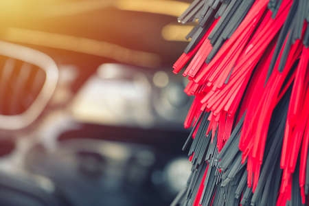 Automatic car wash in action. Car wash concept. Automated technologyの写真素材