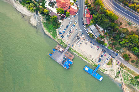 Aerial view of Galati City, Romania. Danube River near city with sunset warm lightの写真素材