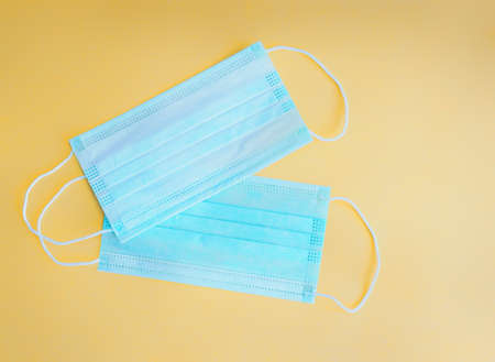 Surgical mask with rubber ear straps. Typical 3-ply surgical mask to cover the mouth and nose....